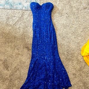 strapless blue prom dress and has never been worn!
